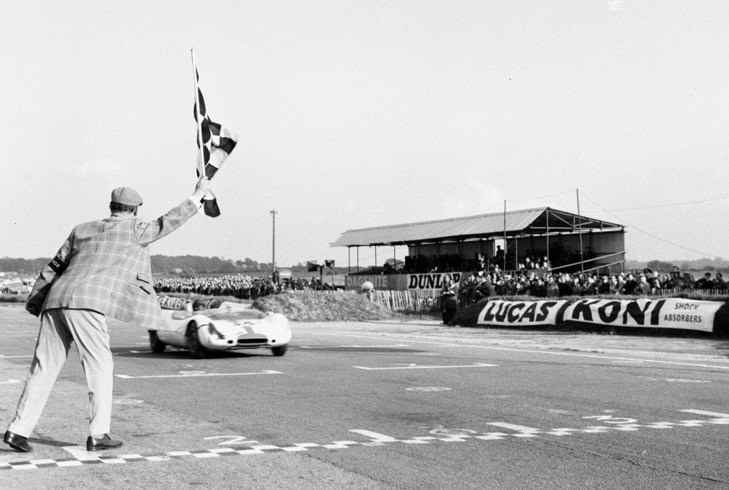 Detail of Jim Clark takes the checkered flag by Staff