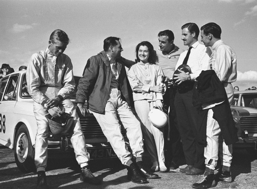 Detail of Christabel Carlisle with some of the world's best male drivers by Staff