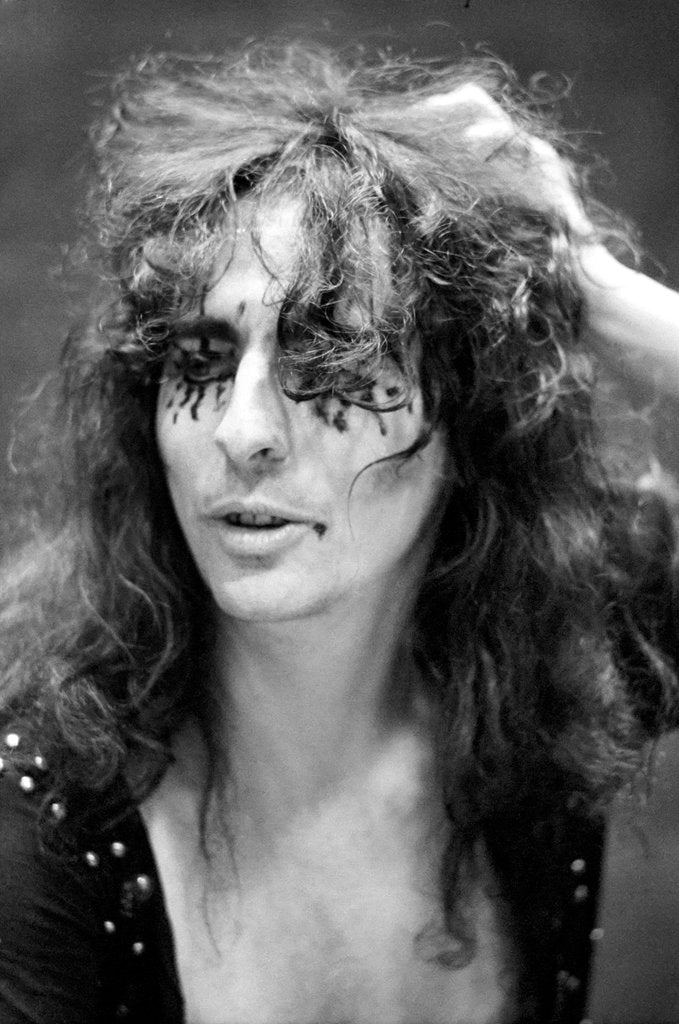 Detail of Alice Cooper with his pet boa constrictor by Staff