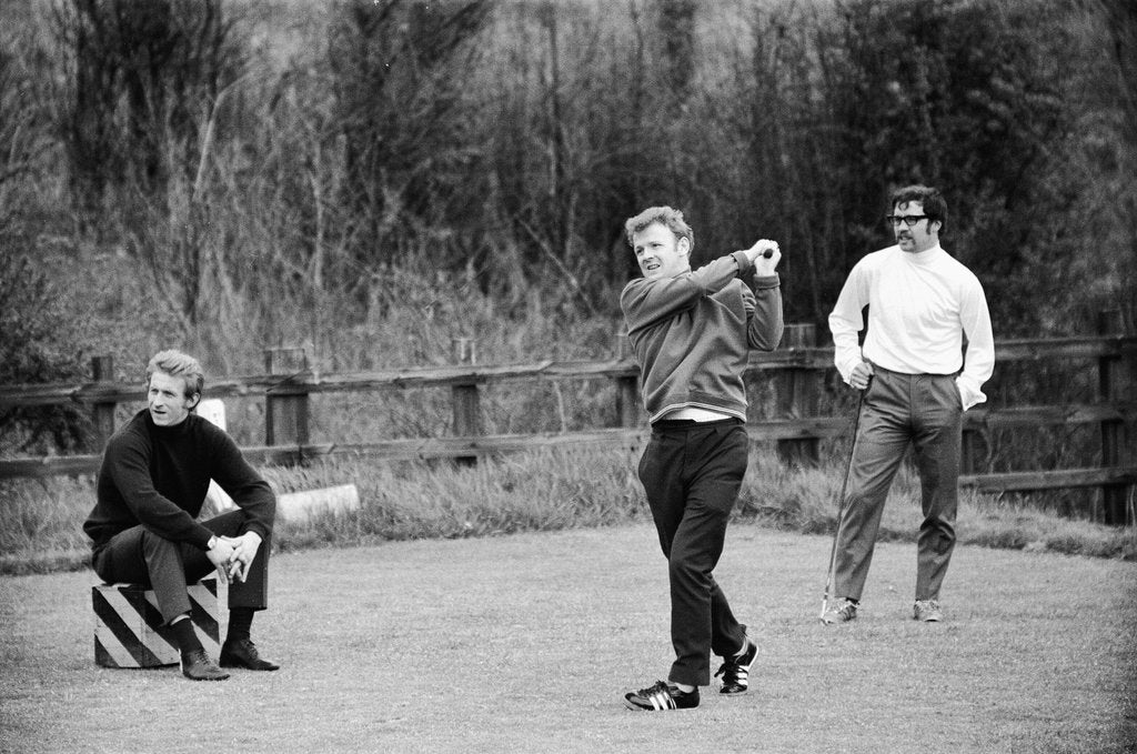Detail of Billy Bremner tees off watched by Denis Law by Monte Fresco