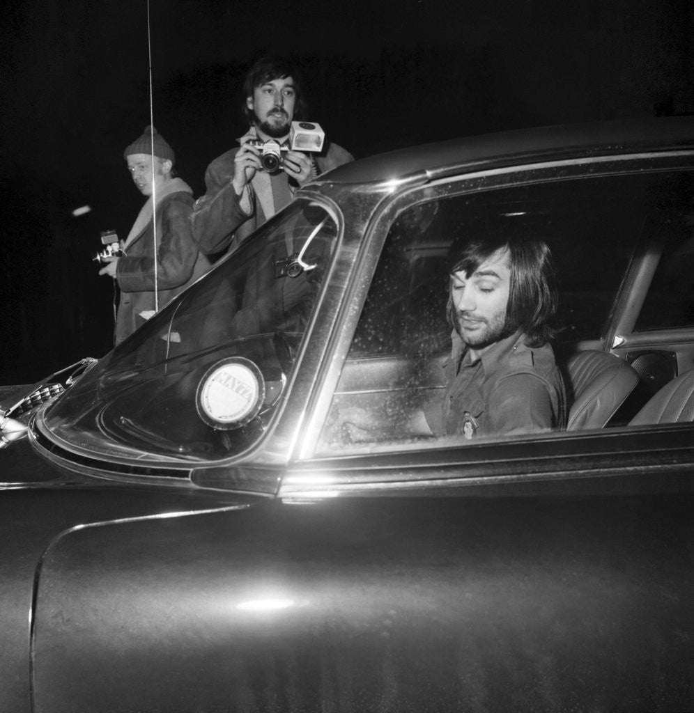 Detail of George Best arriving at Wilmslow station in his Jaguar to meet Carolyn Moore by Staff