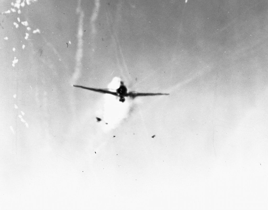 Detail of Japanese plane (Zeke of Oscar) in Lingayen Gulf, diving on the USS New Mexico (BB 40) from astern. Plane struck the port side of the bridge three seconds later. January 6, 1945 by Anonymous