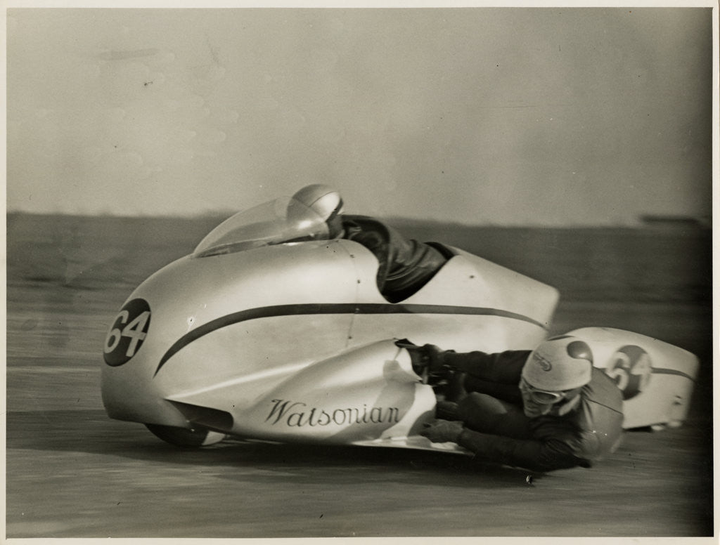 Detail of Eric Oliver, driving Watsonian sidecar outfit, Silverstone, 1954 by T.M. Badger