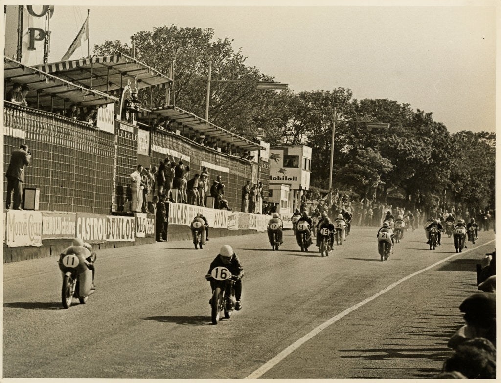 Detail of Competitors leaving the start line during the mass start of the 1958 250cc TT (Tourist Trophy) by T.M. Badger