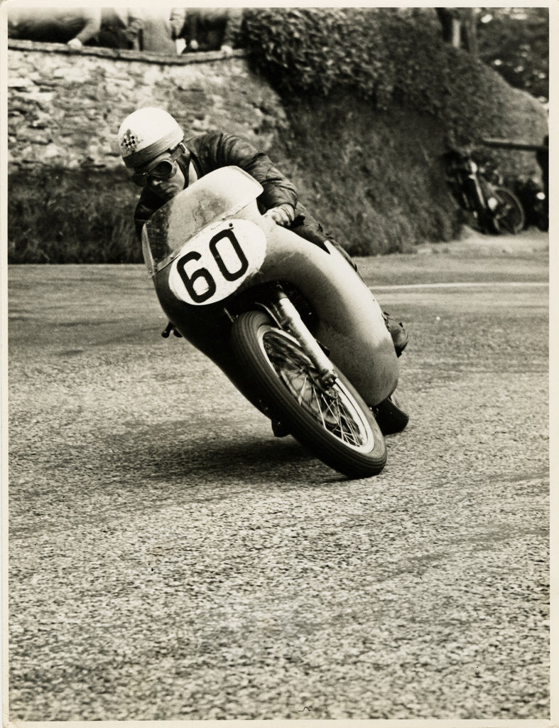 Detail of Eric Hinton, TT (Tourist Trophy) rider, riding 500cc Norton (number 60) by T.M. Badger