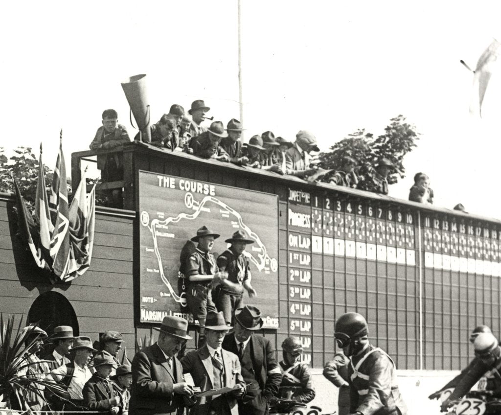 Detail of Onlookers and officials at the Grandstand readying TT competitor 22 to get away, 1928 by Louis Taggart