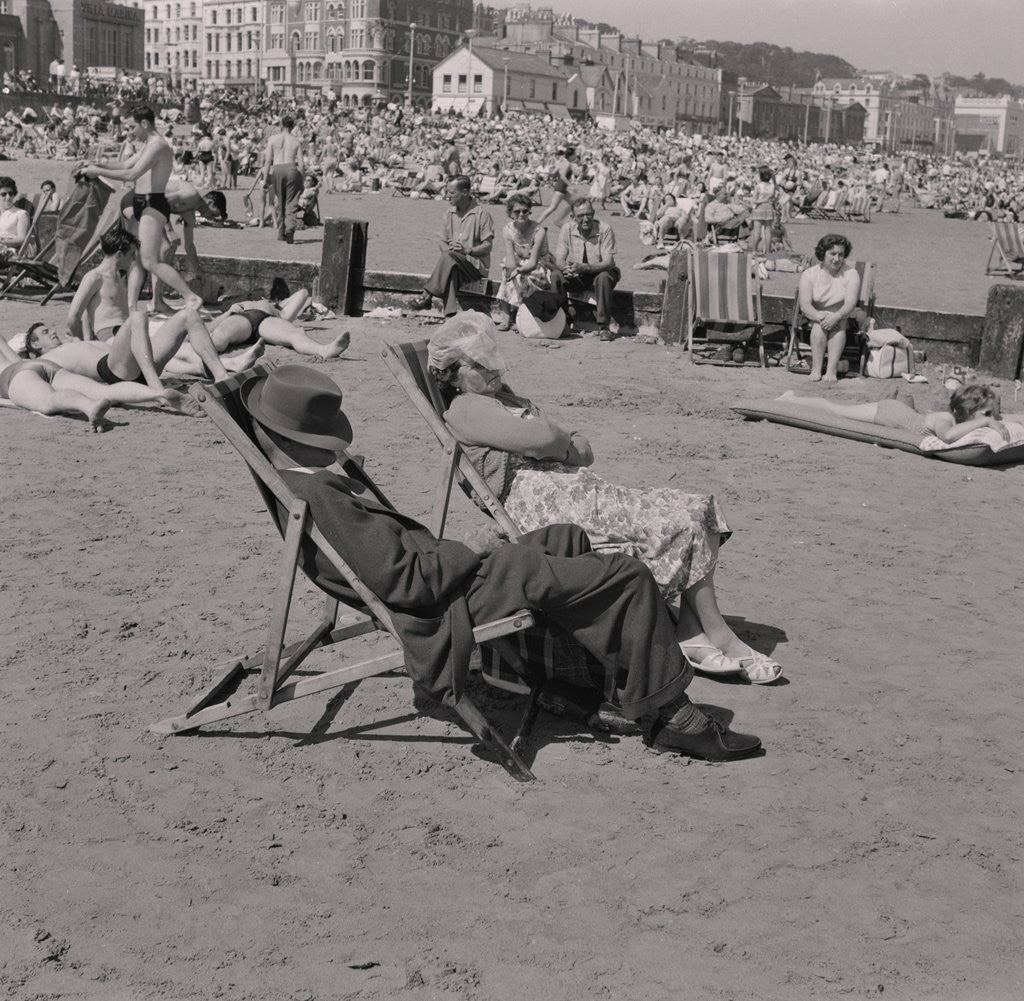 Detail of Holidaymakers on Douglas beach by Manx Press Pictures