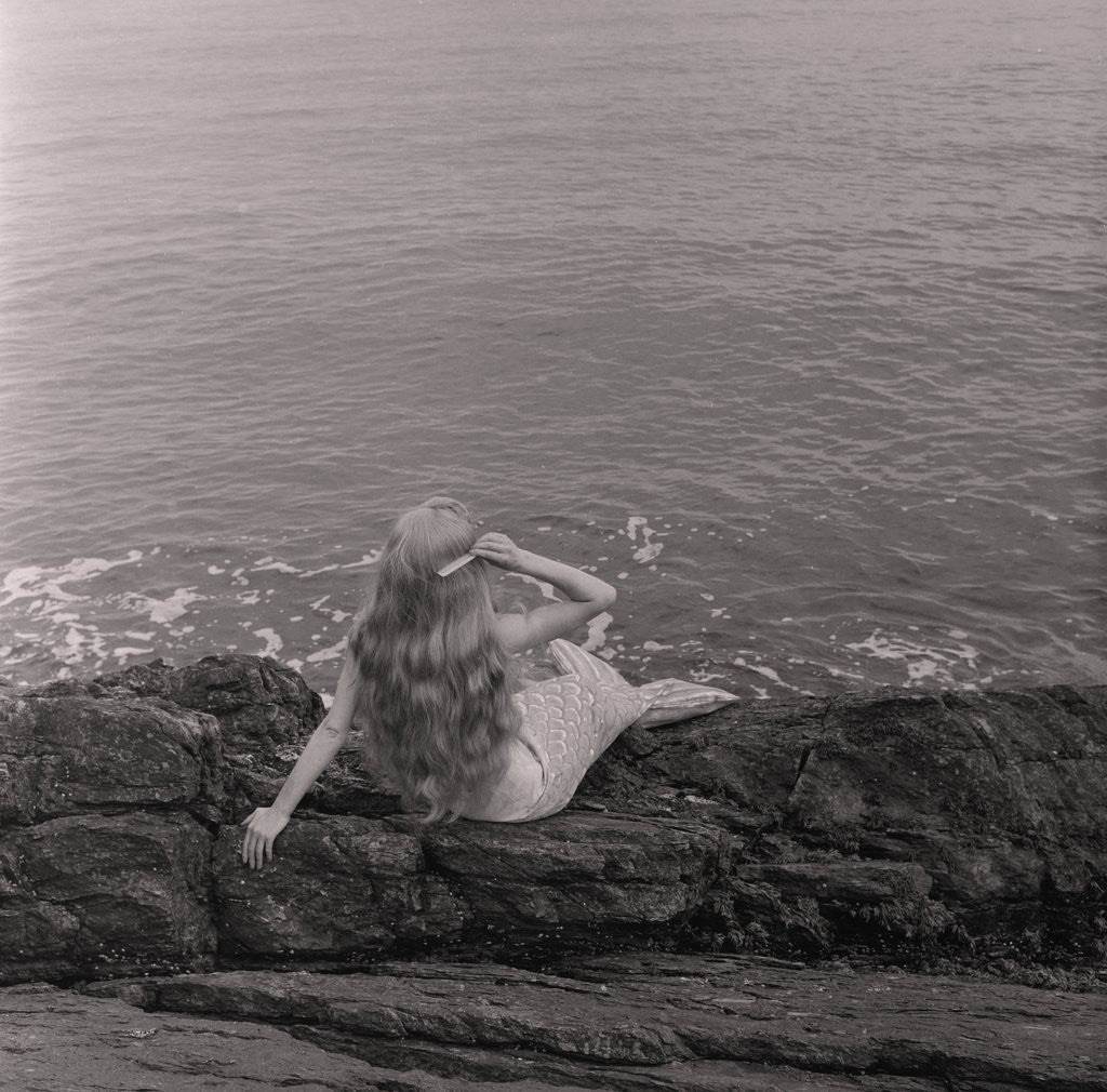 Detail of Mermaid on the rocks at Port Soderick by Manx Press Pictures