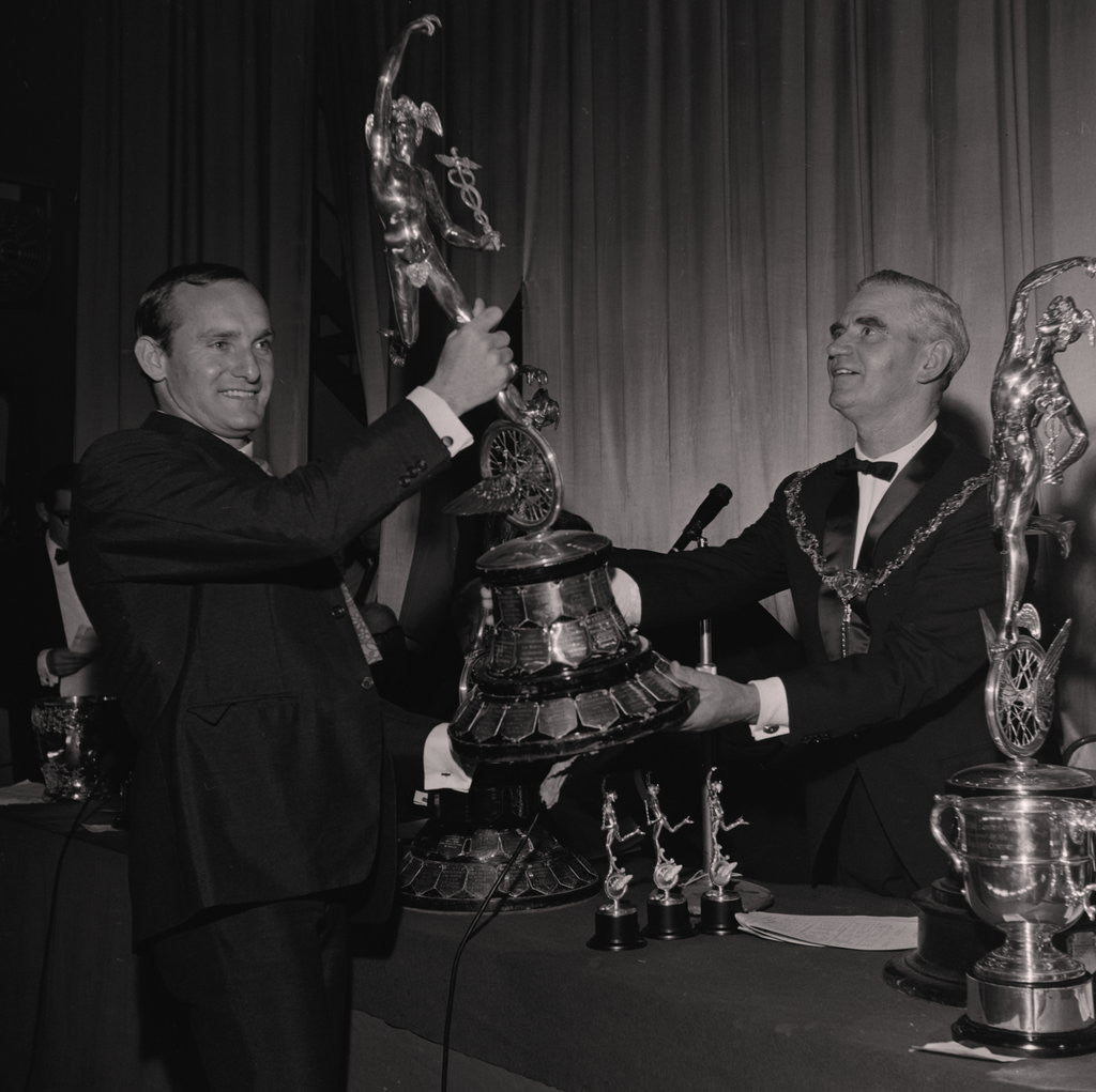 Detail of Mike Hailwood with Senior TT trophy, TT presentations, Villa Marina by Manx Press Pictures