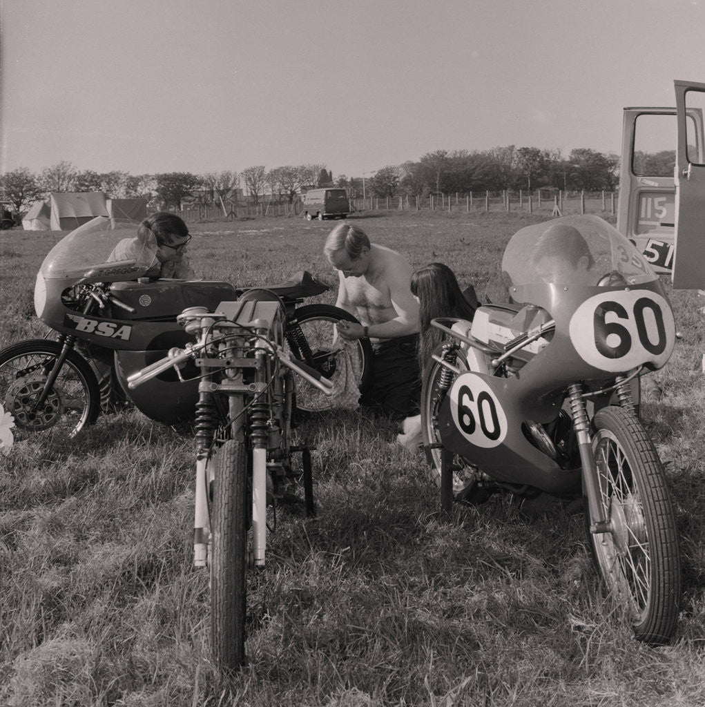 Detail of TT riders behind The Grandstand by Manx Press Pictures