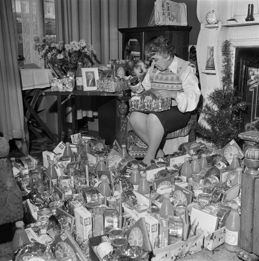 Detail of Woman with Christmas hampers, Isle of Man by Manx Press Pictures