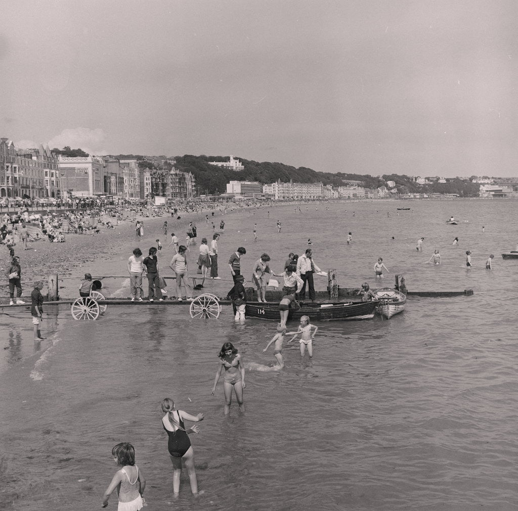 Detail of Holidaymakers on Douglas beach by Manx Press Pictures
