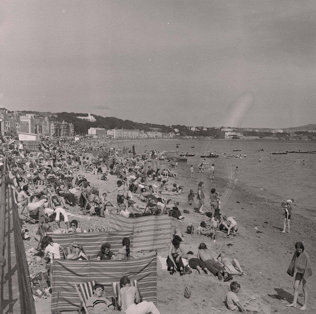 Detail of Holidaymakers on Douglas beach by Manx Press Pictures