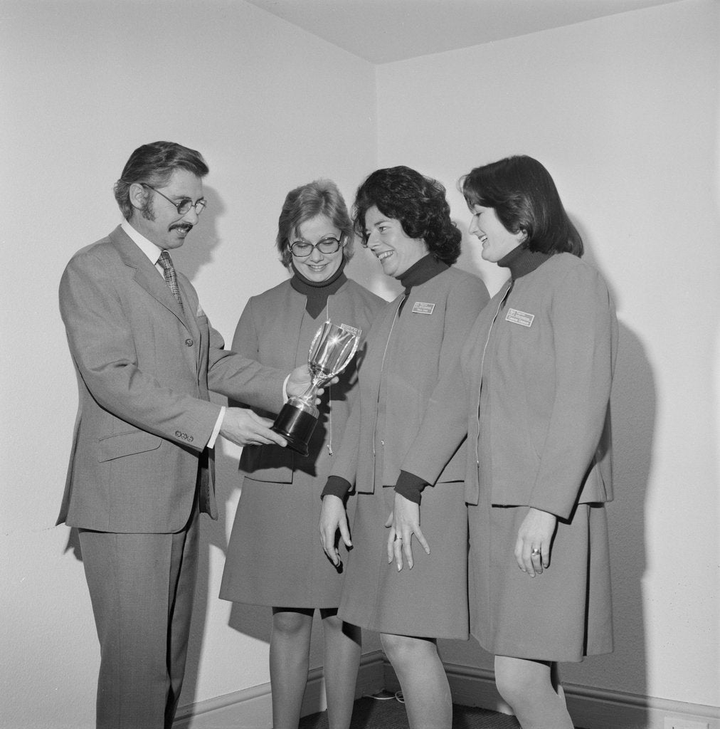 Detail of Isle of Man Tourist Board women with trophy by Manx Press Pictures