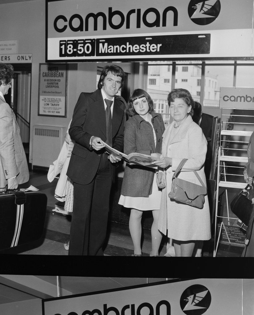 Detail of Holidaymakers arrive at Ronaldsway Airport by Manx Press Pictures