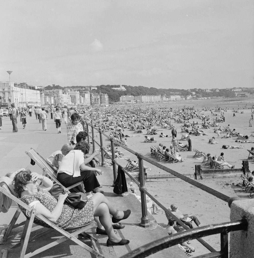Detail of Holidaymakers on Douglas beach by Manx Press Pictures