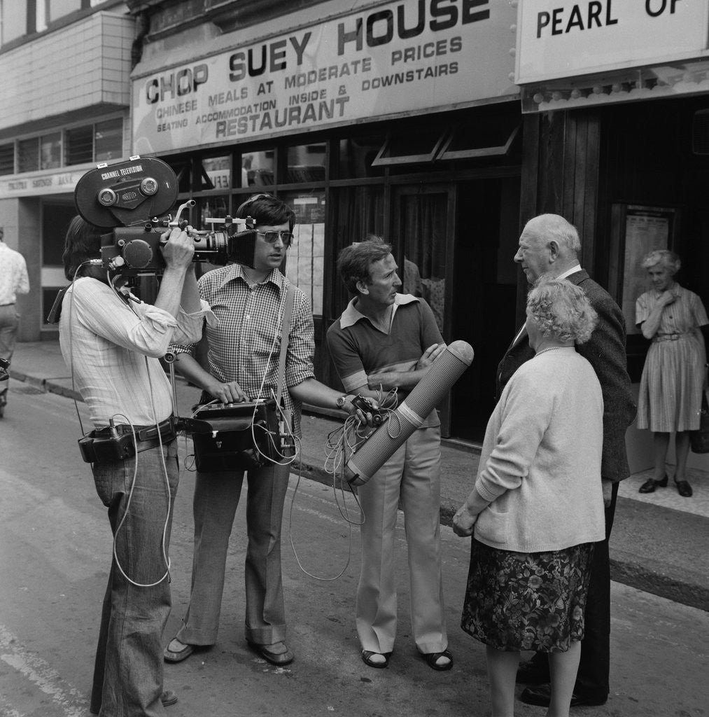 Detail of TV interviews in street by Manx Press Pictures