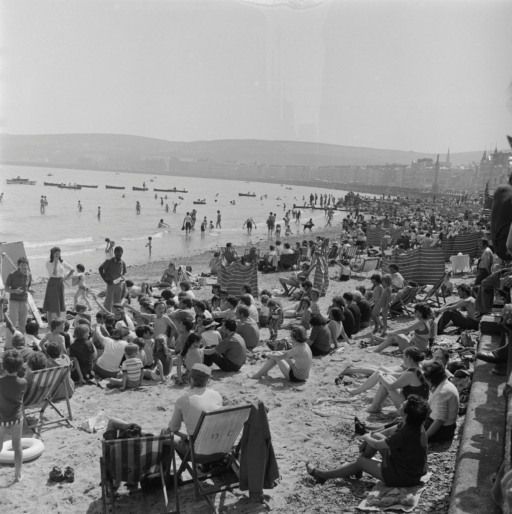 Detail of Holidaymakers on Douglas beach by Manx Press Pictures