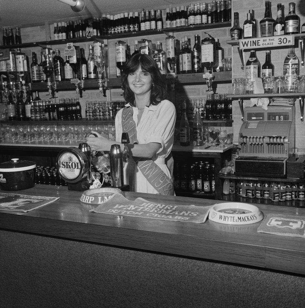 Detail of Miss Isle of Man behind the bar by Manx Press Pictures