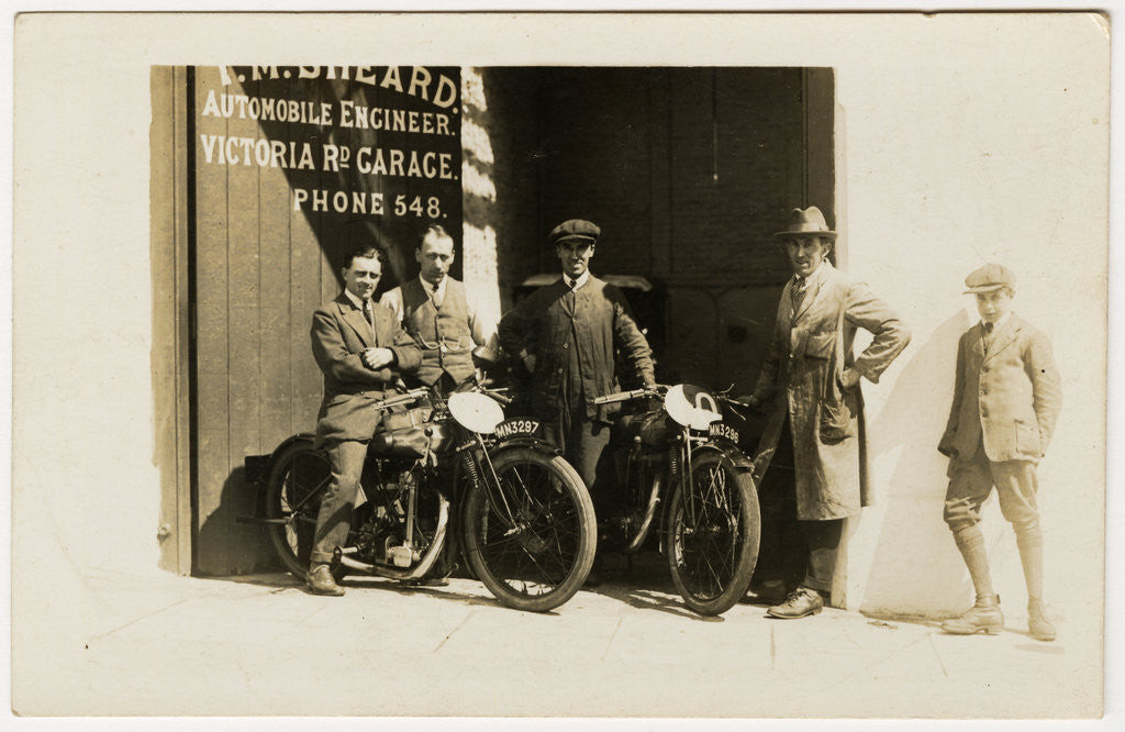Detail of Group of riders and mechanics outside the garage of T.M.Sheard, TT (Tourist Trophy) rider, Automobile Engineer, Victoria Road Garage by Thomas Horsfell Midwood
