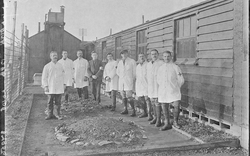 Detail of First World War Internees in front of an Internment Hut (Medical/ Hospital Staff), Camp 2, Knockaloe Camp, Isle of Man by Unknown