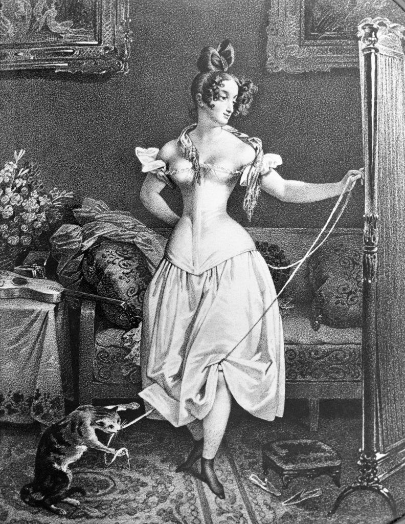 Detail of Woman in Corset with Cat Toying at Her Ribbon by Corbis