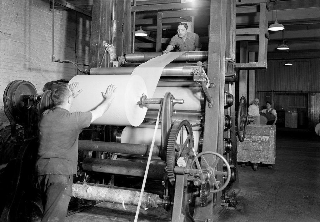 Detail of Mt. Holyoke, Massachusetts - Paper. American Writing Paper Co. Super-calender - putting on roll, starting operation, 1936 by Lewis Hine