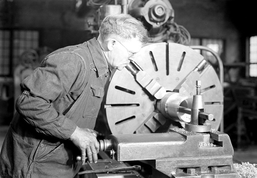 Detail of Eddystone, Pennsylvania - Railroad parts. Tool-builder planing for a taper shoe on a steam hammer ram, March 1937 by Lewis Hine