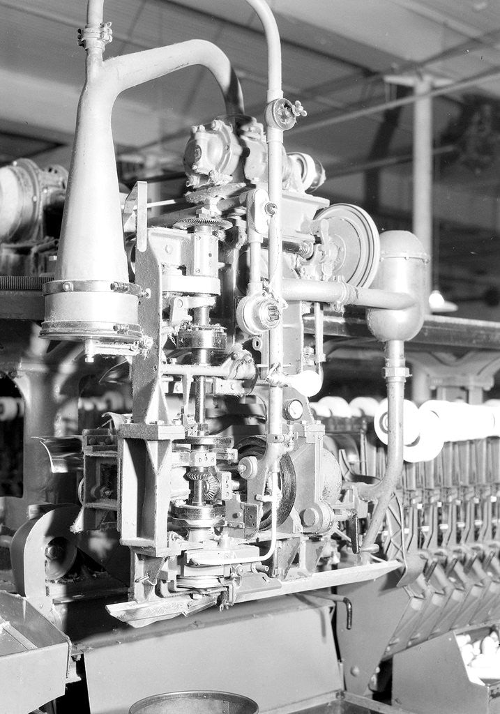 Detail of Manchester, New Hampshire - Textiles. Pacific Mills. Barber-Colman Automatic Spooler. (side view) Tying machine close up, April 1937 by Lewis Hine