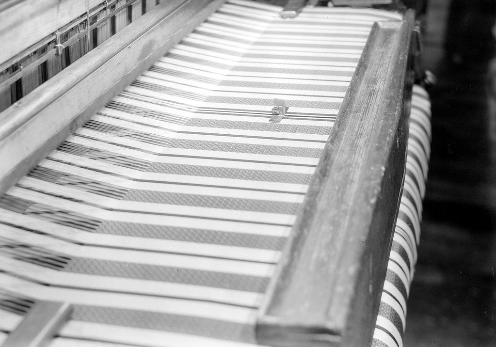 Detail of Paterson, New Jersey - Textiles. Wishnack Silk Company. Picture of a knife cutting a novelty. by Lewis Hine