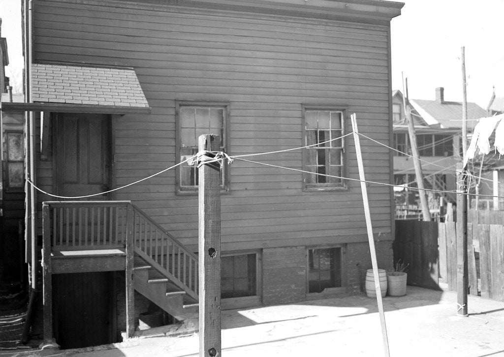 Detail of Paterson, New Jersey - Textiles. Home of silk workers in rear (inner) court off Sealey St. (very poor interior), March 1937 by Lewis Hine