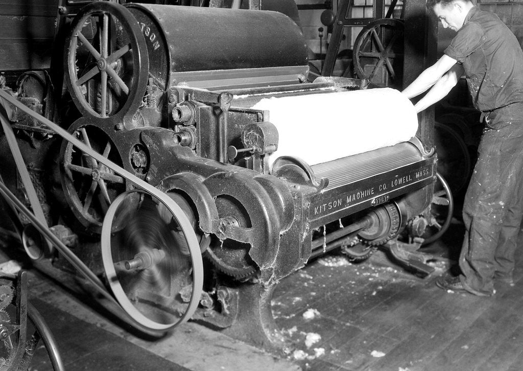 Detail of Millville, New Jersey - Textiles. Millville Manufacturing Co. Man rolling fabric, 1936 by Lewis Hine