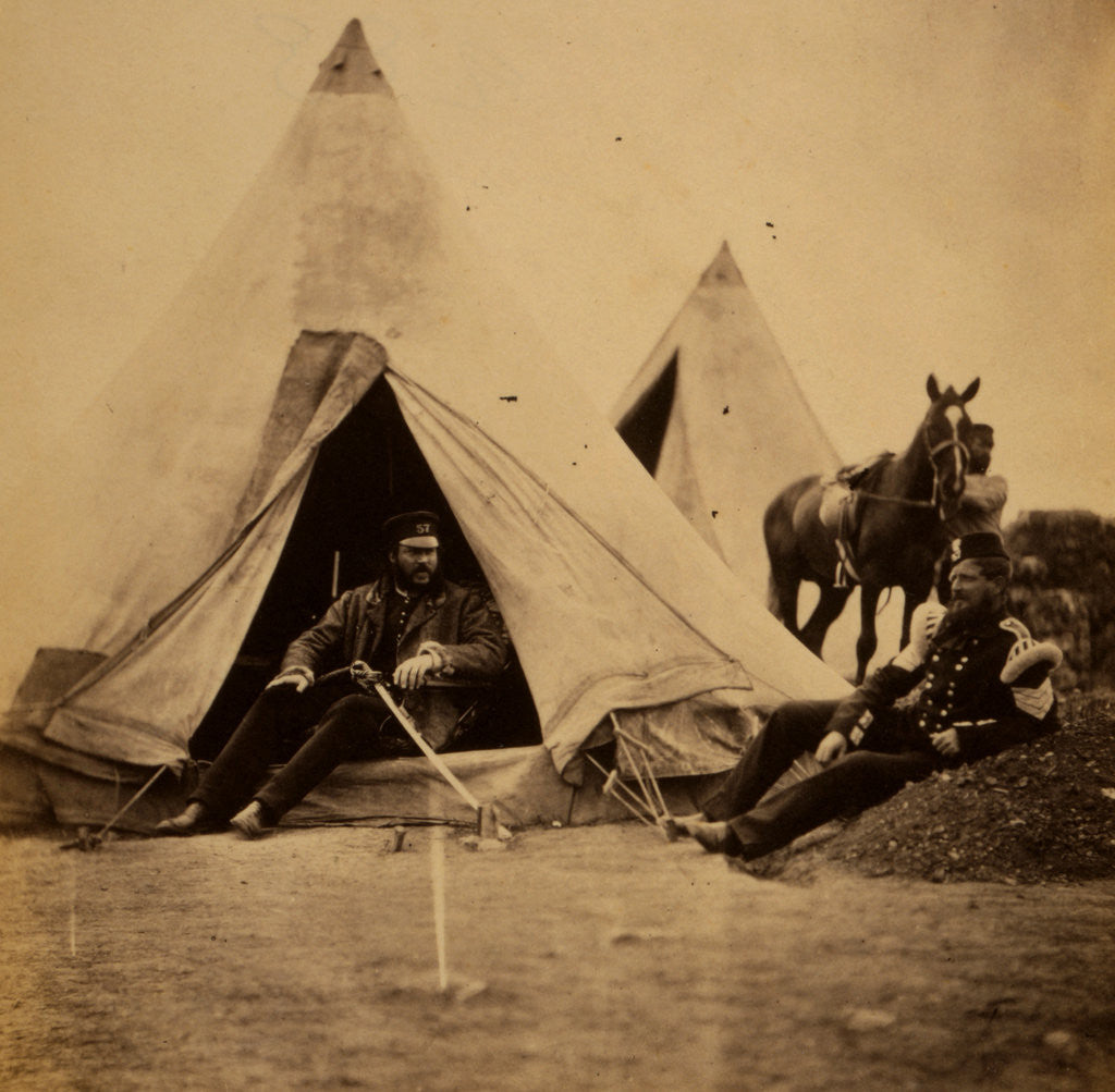 Detail of Officer of the 57th Regiment sitting with a sword across his lap at opening to his tent by Roger Fenton
