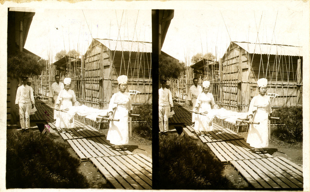 Detail of Japanese nurses carrying a patient on a stretcher by Anonymous