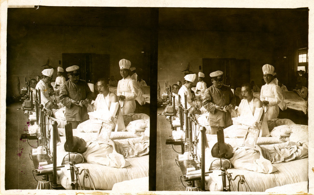 Detail of Nurses and a doctor attending wounded soldiers on a hospital ward by Anonymous
