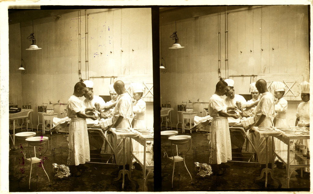 Detail of Japanese doctors operating on a patient's arm by Anonymous