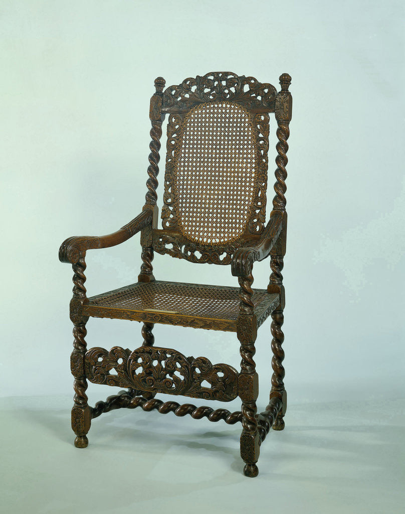 Detail of Armchair which swung back posts are topped by twisted vases by Anonymous