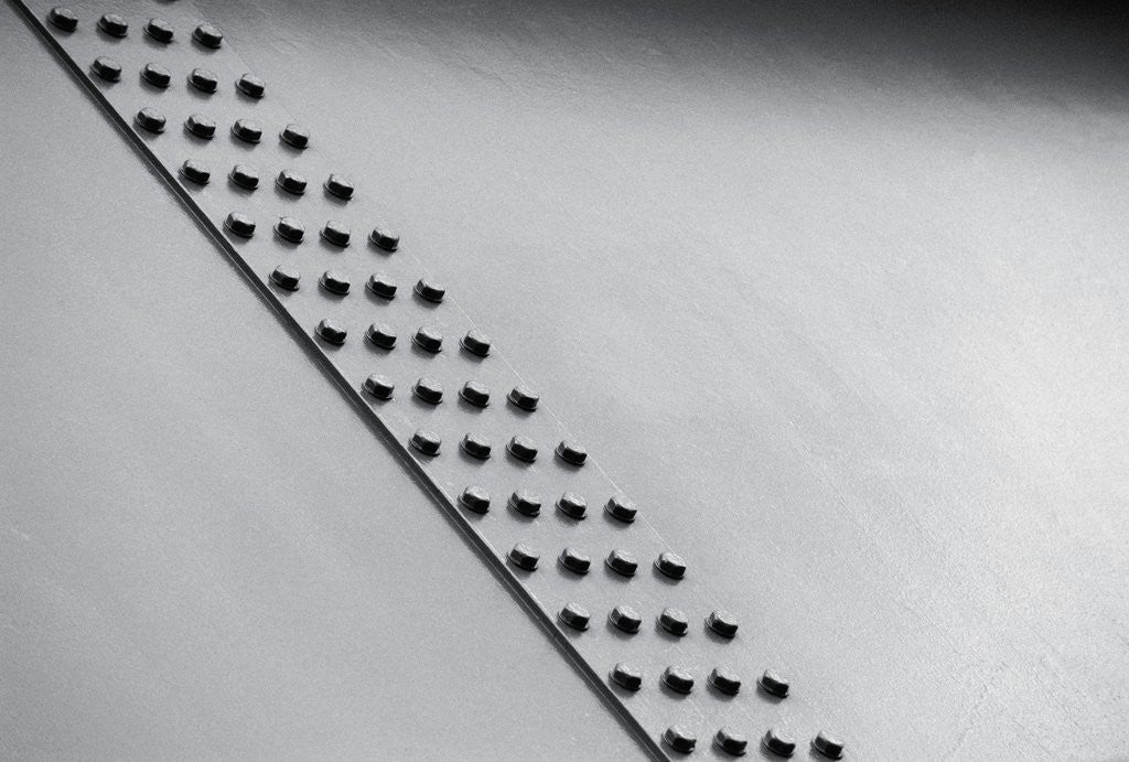 Detail of Bolts in Steel Plate by Corbis