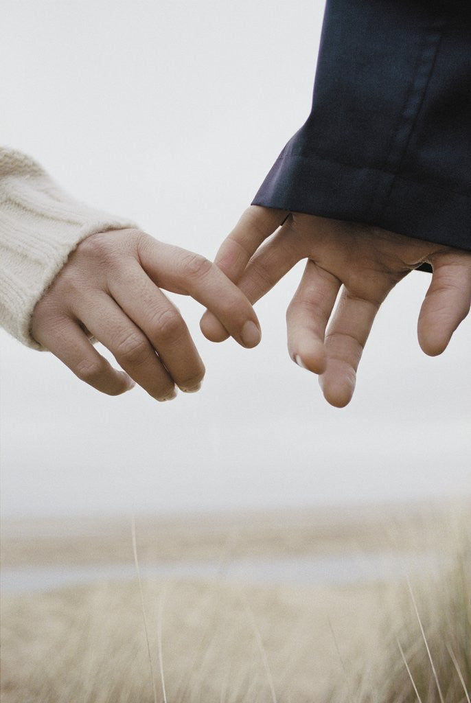 Detail of Couple Holding Hands by Corbis