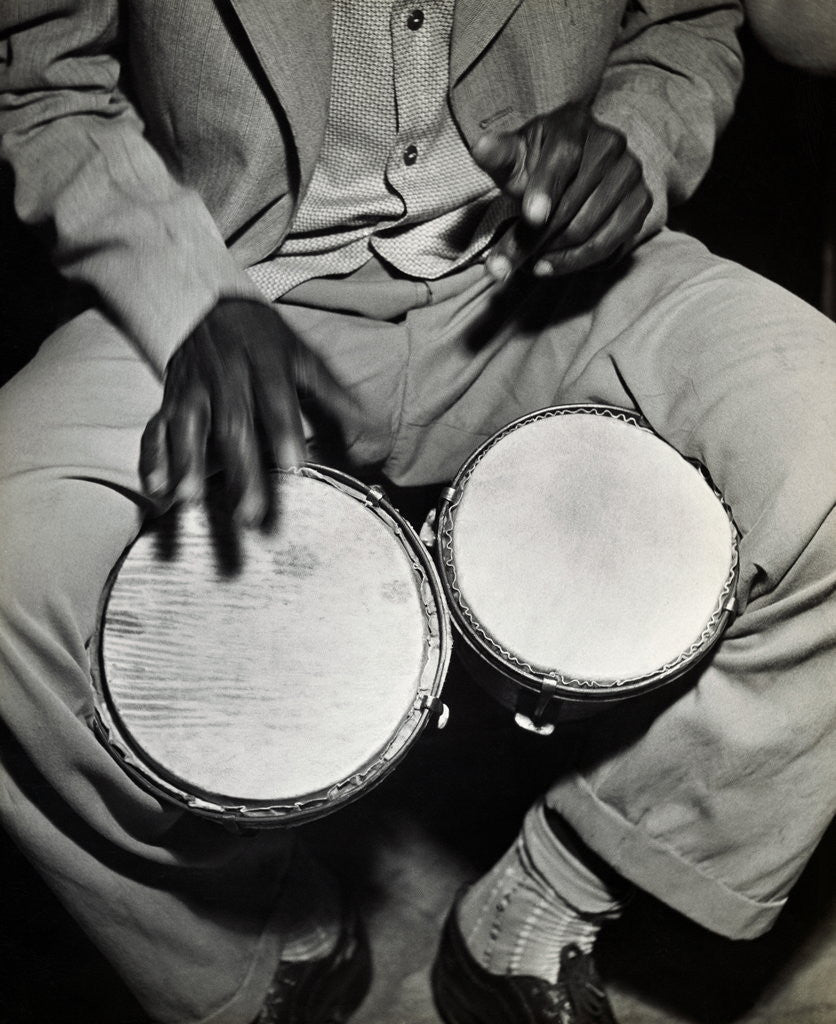Detail of Man Playing the Bongo Drums by Corbis