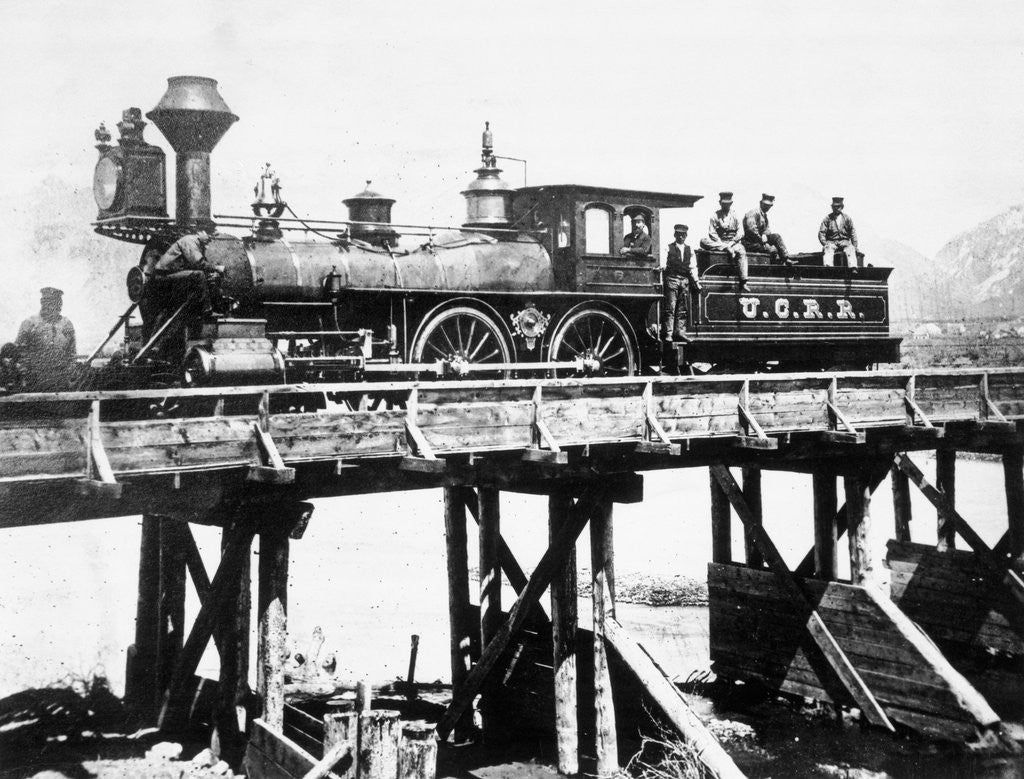 Detail of Steam Locomotive Passing over Trestle Bridge by Anonymous