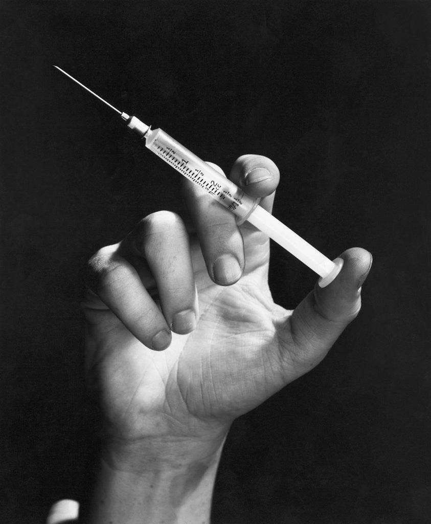 Detail of Hand Holding Syringe by Anonymous