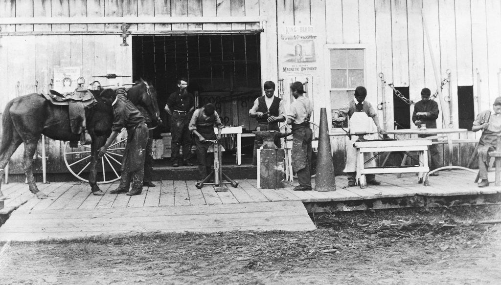 Detail of Native Americans Working on Blacksmith Equipment by Anonymous