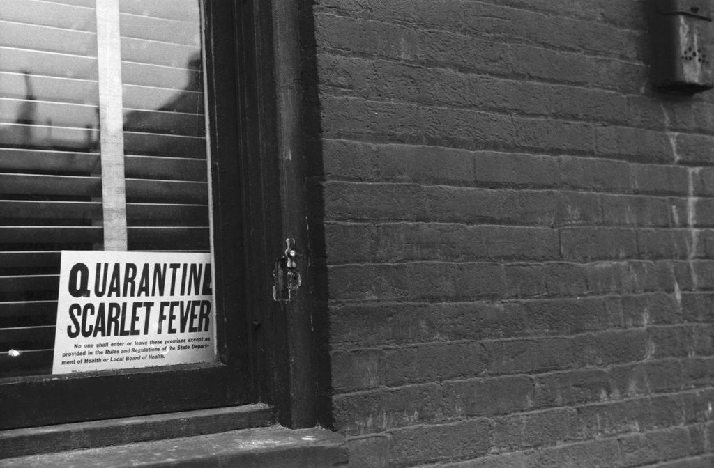 Detail of Sign Posted in Window of Building by Anonymous