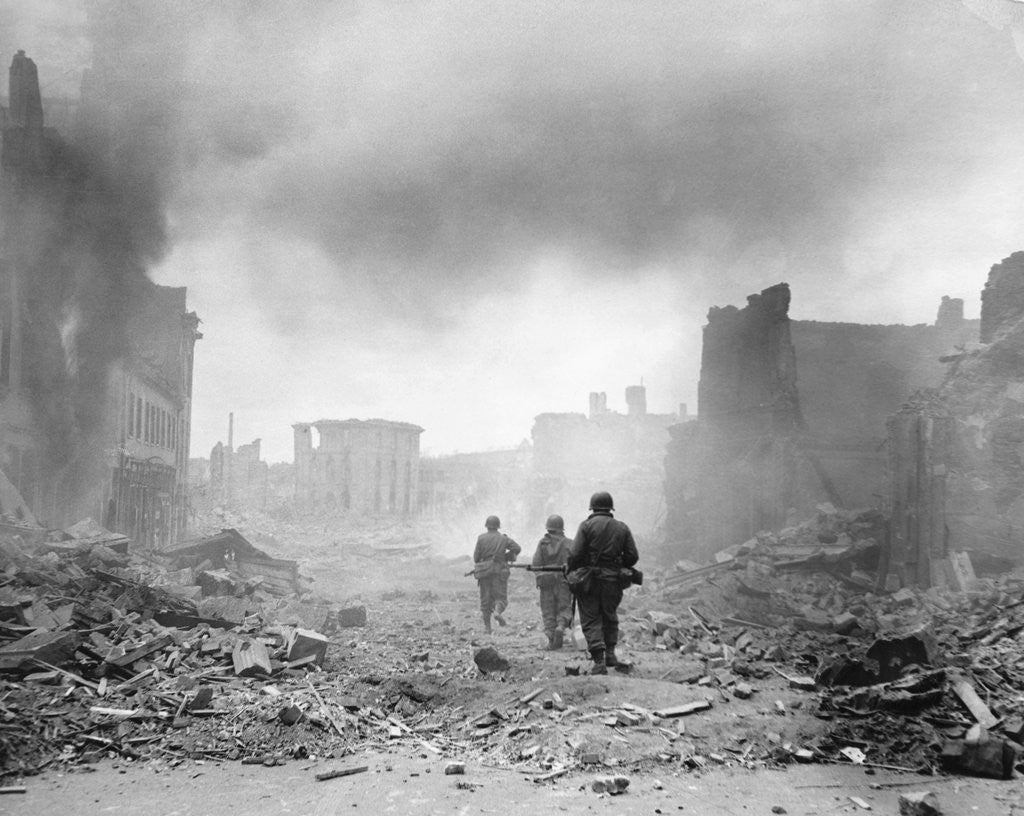 Detail of United States Soldiers Trekking Carefully Through War Torn Debris by Anonymous