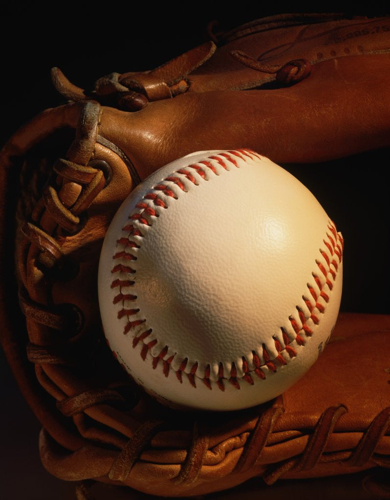 Detail of Baseball and a Pitcher's Mitt by Corbis