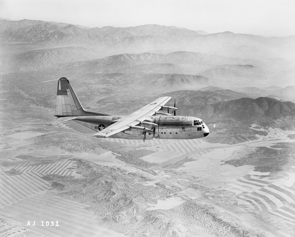 Detail of Airplane Flying Over Landscape by Anonymous