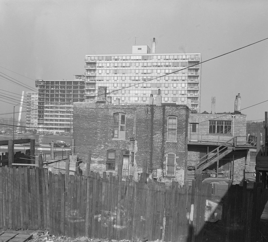 Detail of Modern Apartment Building Behind Slum Tenement in Chicago by Anonymous