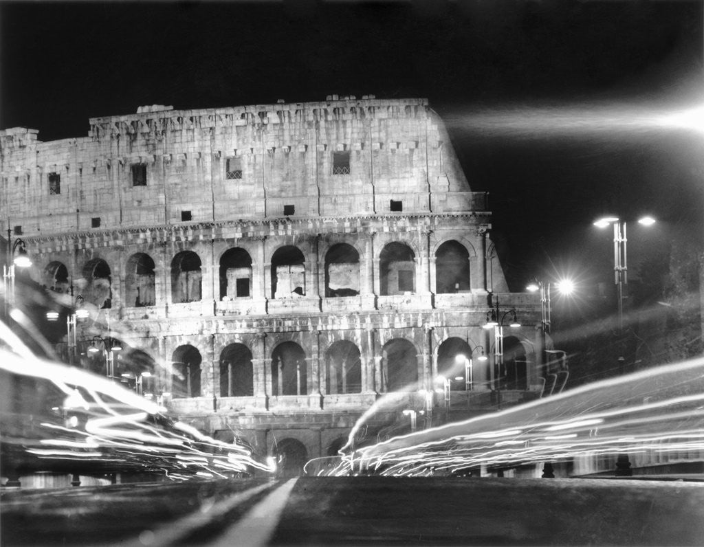 Detail of Darkness and Streaks of Light on Exterior of a Colosseum by Corbis