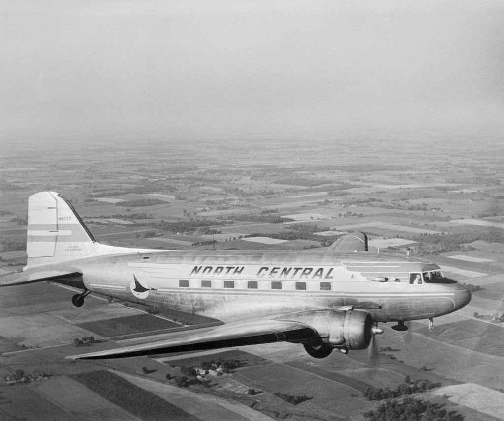 Detail of Douglas DC-3 Plane in Flight by Anonymous